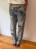 Jeans de mezclilla rasgados